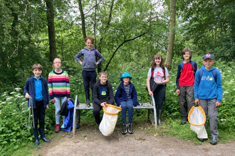group of young volunteers at nature reserve