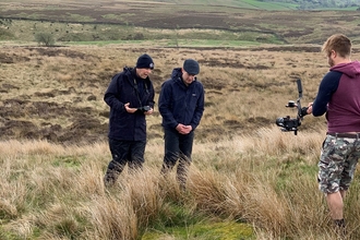 Matt Baker and Mark Dinning talking on camera in Cuthbert's Moor Nature Reserve