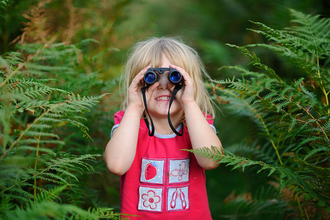 Child with binoculars