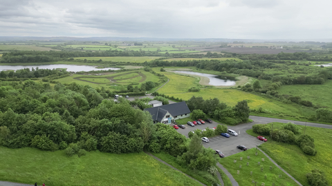 Aerial view of nature reserve with visitor centre in centre