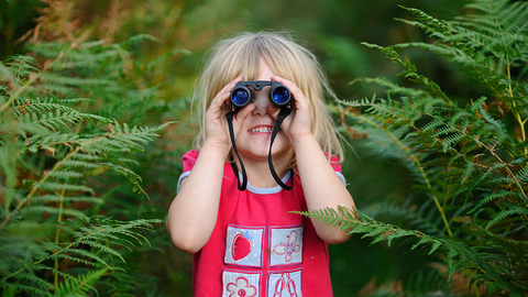 Child with binoculars