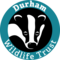 Badger graphic with teal surround and words Durham Wildlife Trust