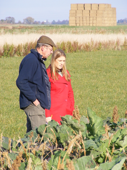 The farmers at Vine House Farm on their land