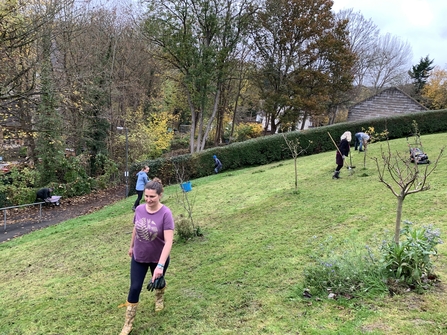 volunteers working on a grass verge. 