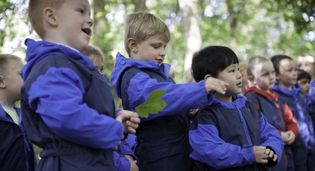 Children learning about wildlife in nature